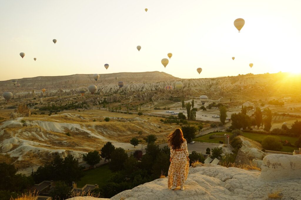 hot air balloons, valley, girl-5630493.jpg